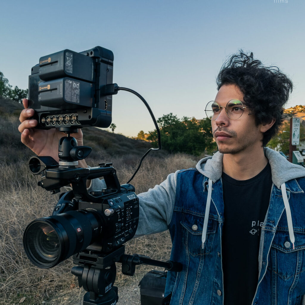 Juan Abad filming outdoors